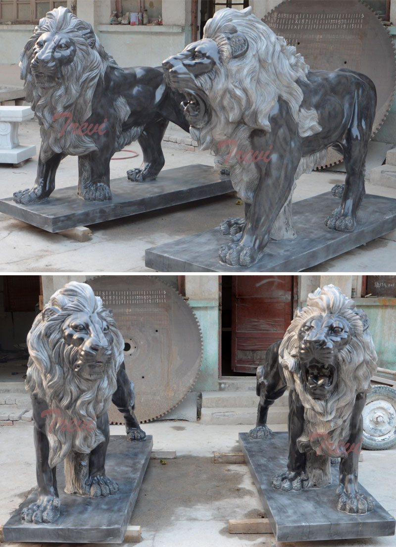 Pair of standing black lions statue in front of house for sale