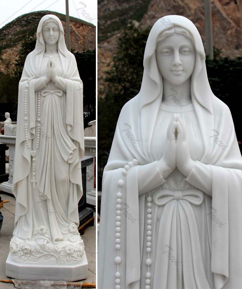 Our lady of Lourdes and st Bernadette statue