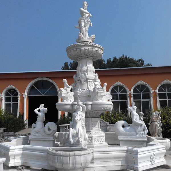 Luxury white marble water fountain with statues for the center of the hotel