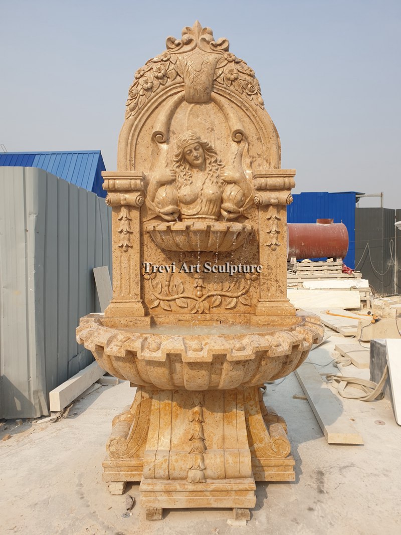 marble courtyard wall fountain with female relief for garden