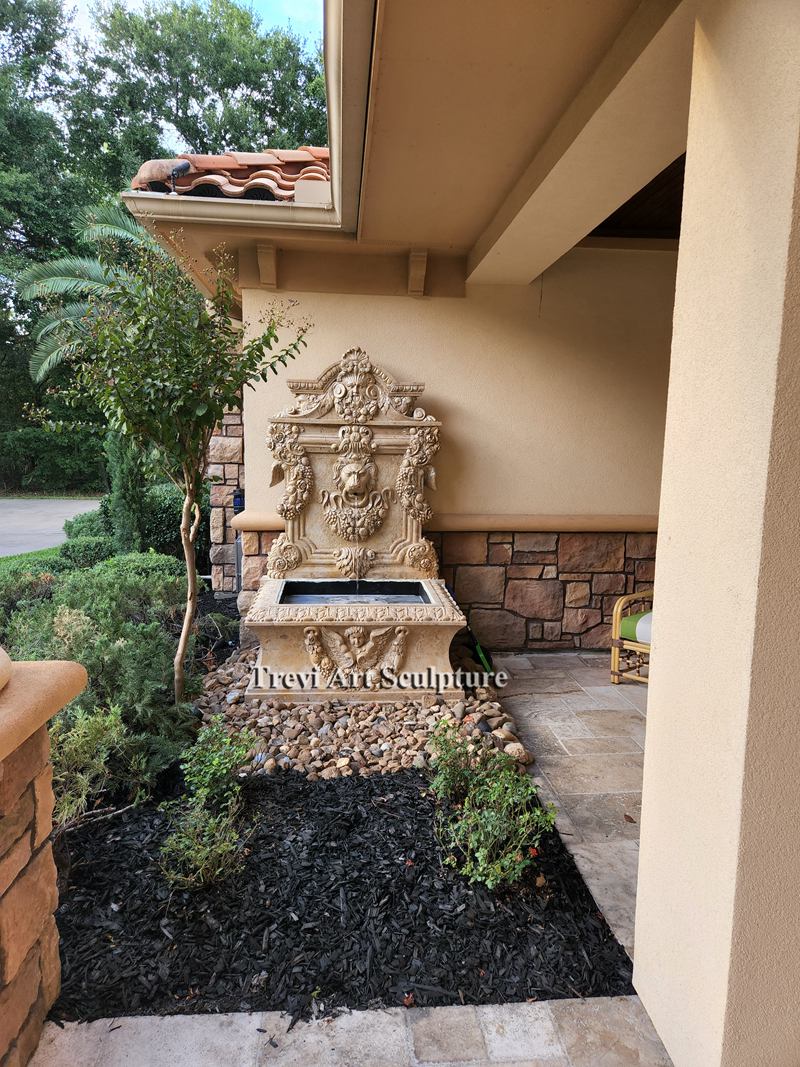 tall stone lion head wall fountain feedback