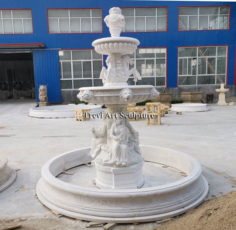 white marble horse fountain with sitting woman statue