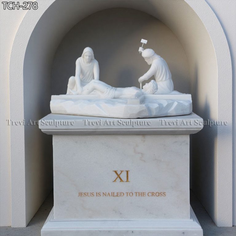 jesus is nailed to the cross marble statue