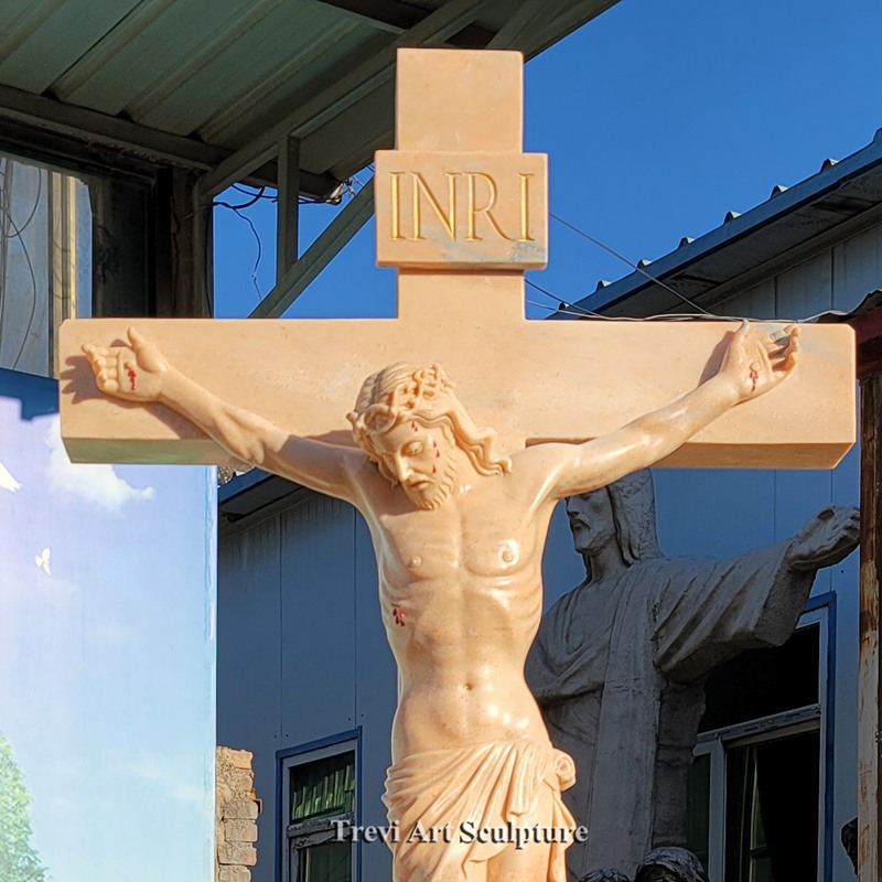 jesus on cross statue