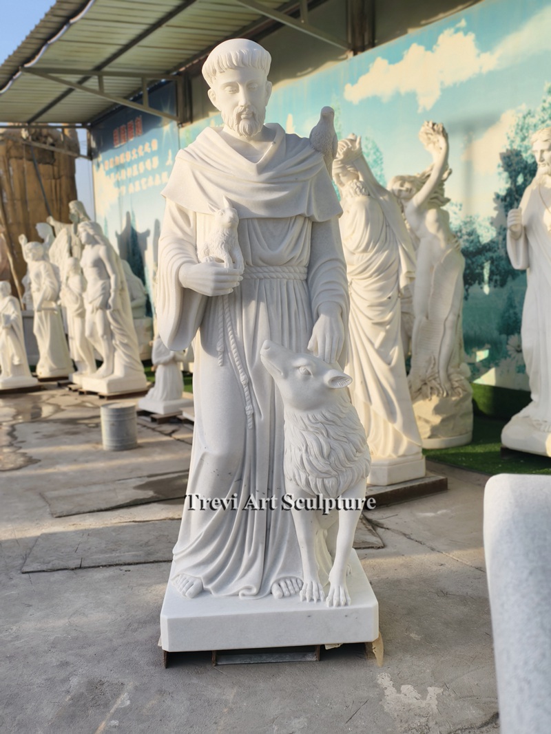 marble st francis statue with animals