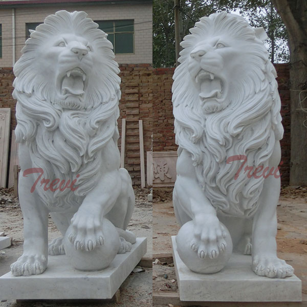 White marble sitting lion with paw on ball for front porch