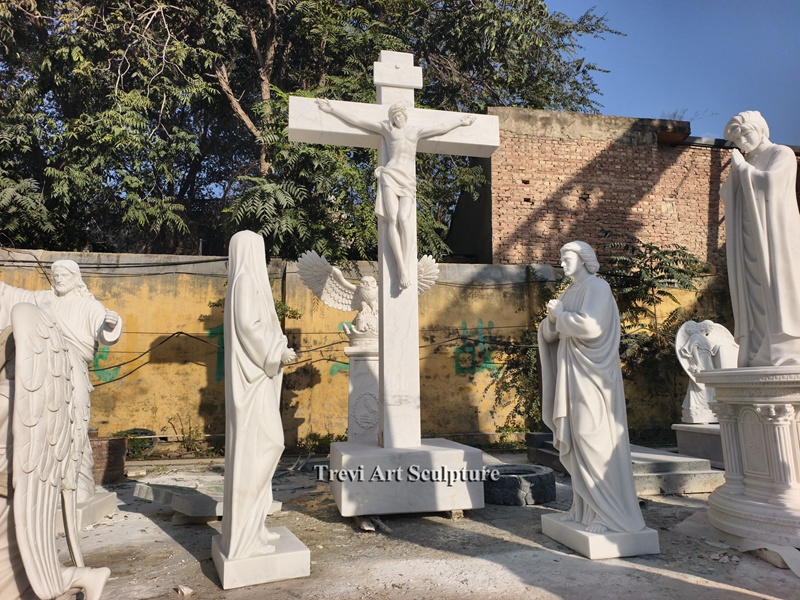 outdoor marble crucifixion scene with virgin mary and saint john