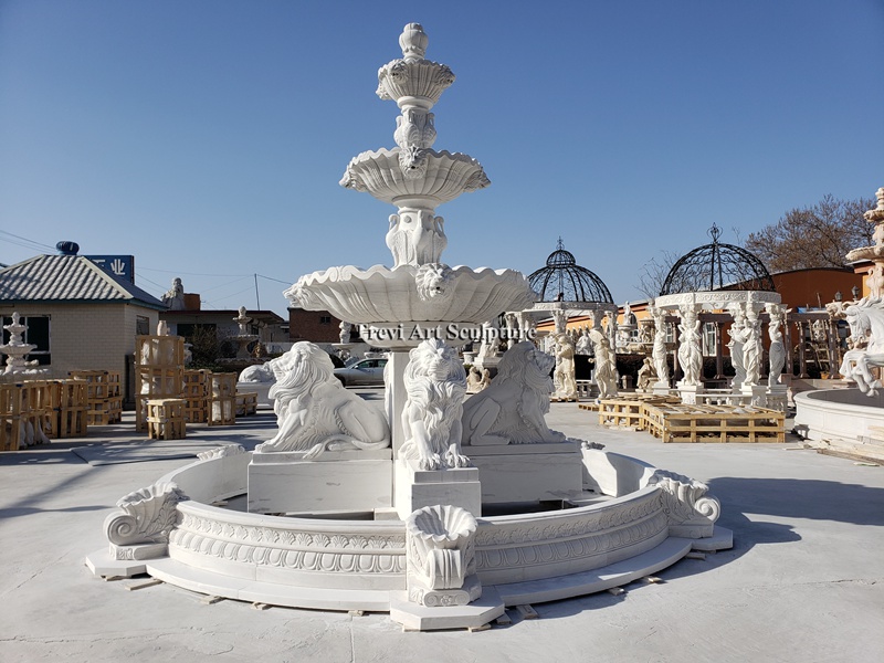 fountain with sitting lion statues