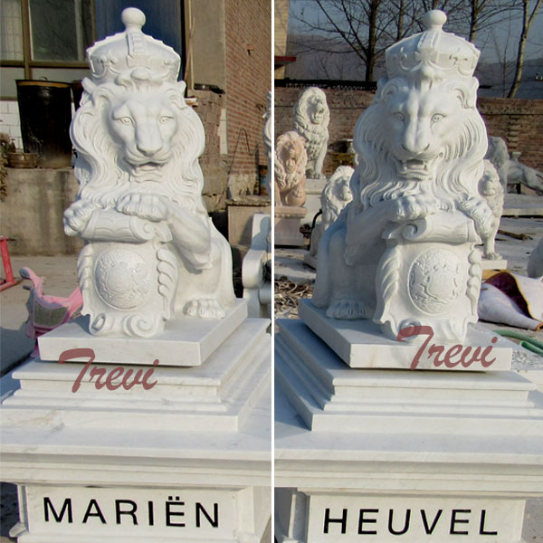 Pair of white marble king lion statue with shield and crown in front of house