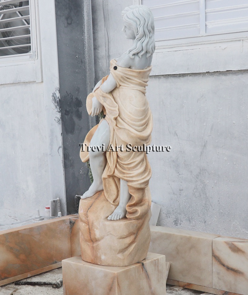 marble beige fountain with female statue