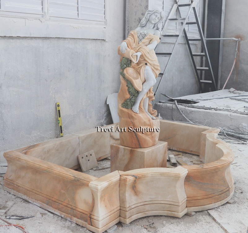 marble beige fountain with female