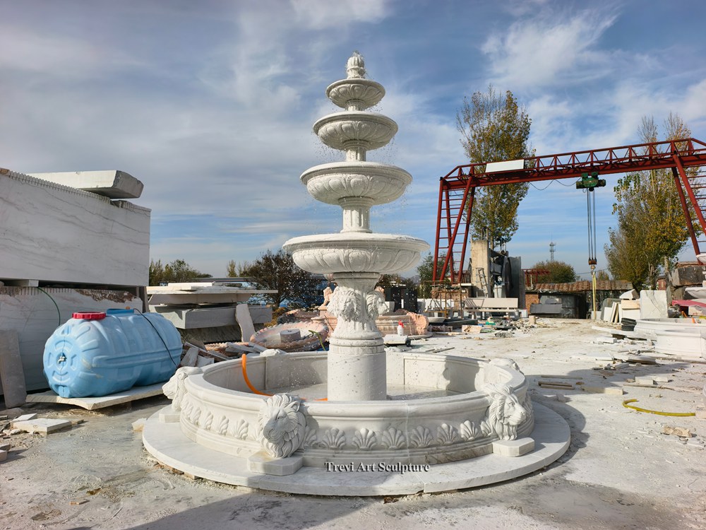 four tier outdoor white marble fountain