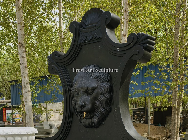 granite wall water fountain with lion head