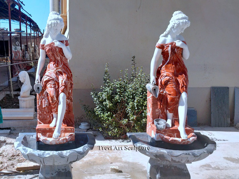 red and white marble female statue fountain