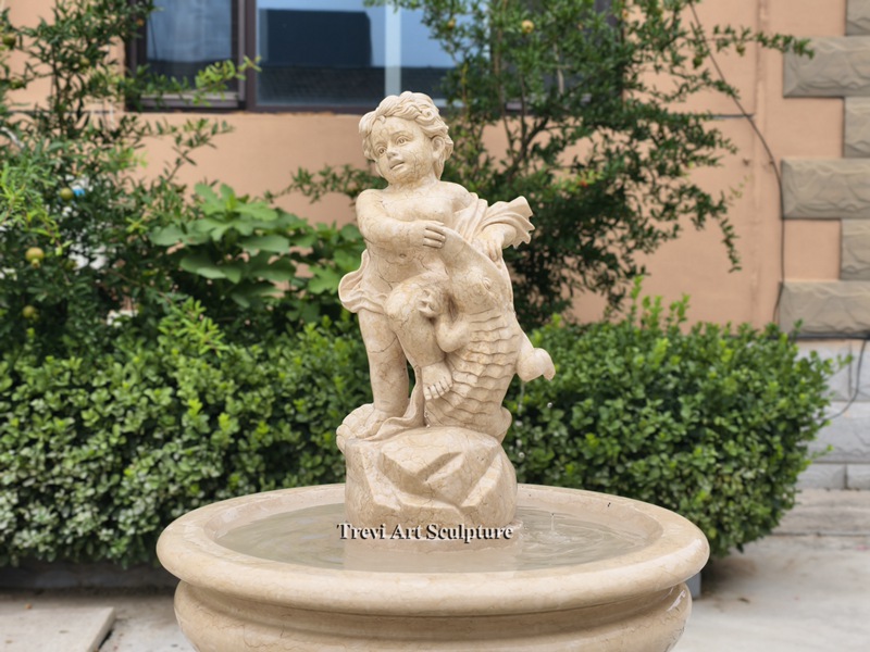outdoor marble boy and fish statue fountain