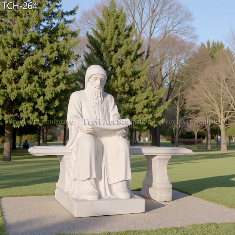 marble st charbel statue sitting on bench for garden