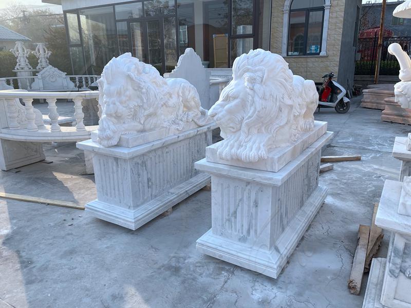 lion statues for front porch meaning