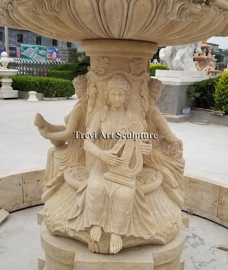 water fountain lady with horse and lion head