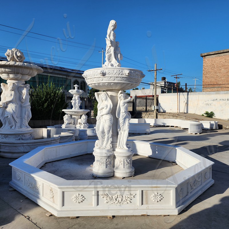 white marble statue water fountain