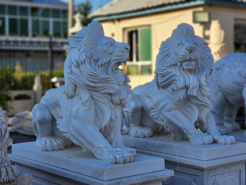 1. Regal Lion Statues