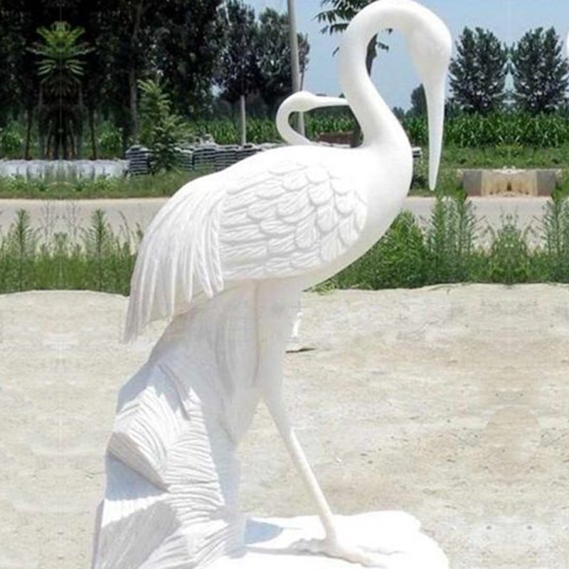 7. Serene Crane Statues