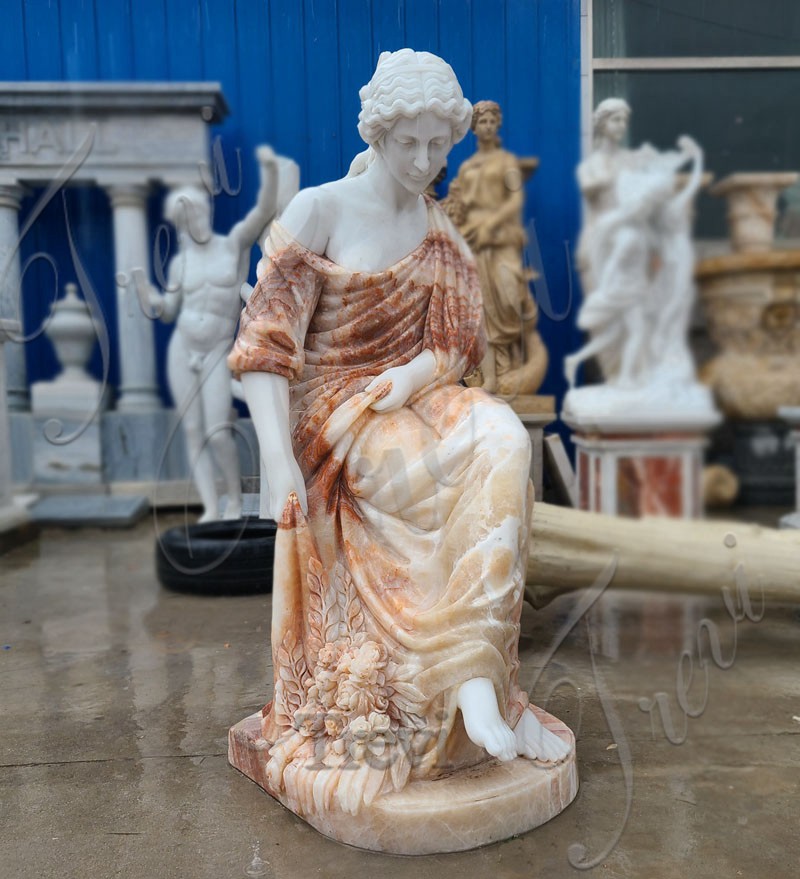 10. Marble Sitting Female Statue