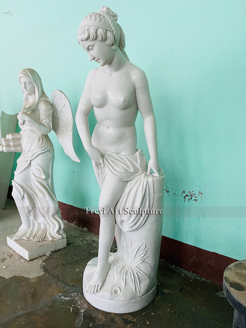 classic white marble bathing venus statue