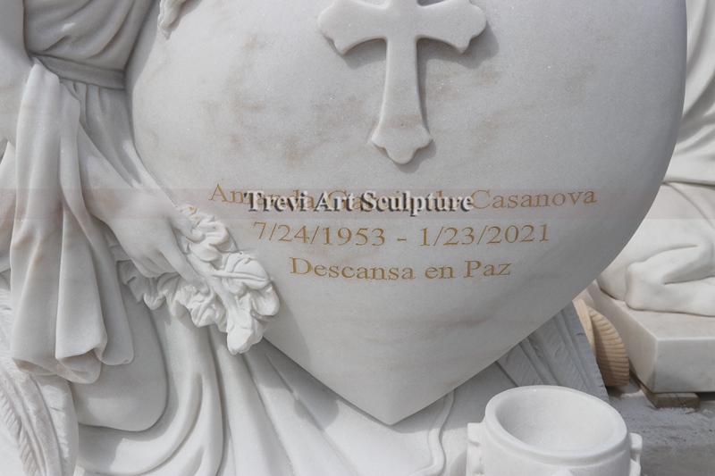 custom white marble angel headstone detail