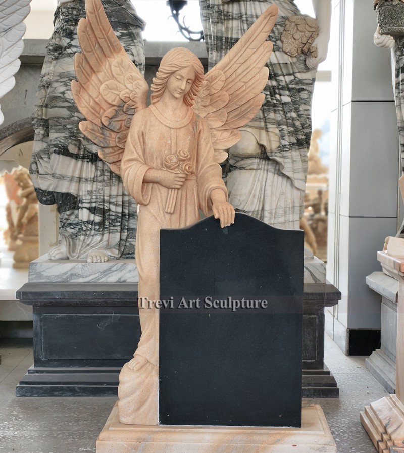 red marble standing angel headstone monument