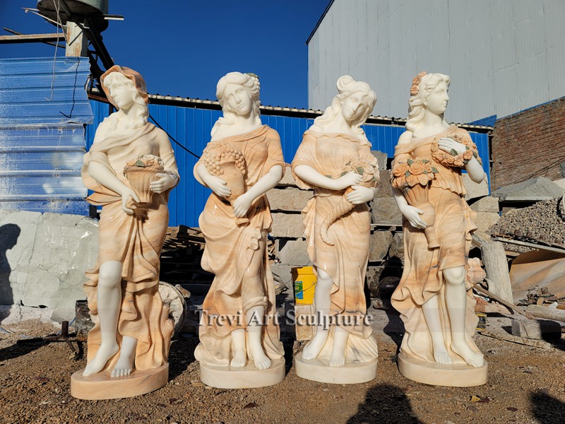 marble goddesses of the four seasons statues