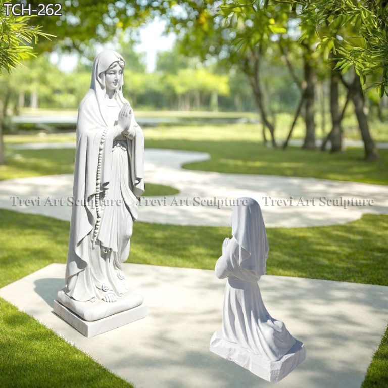 our lady of lourdes statue with bernadette