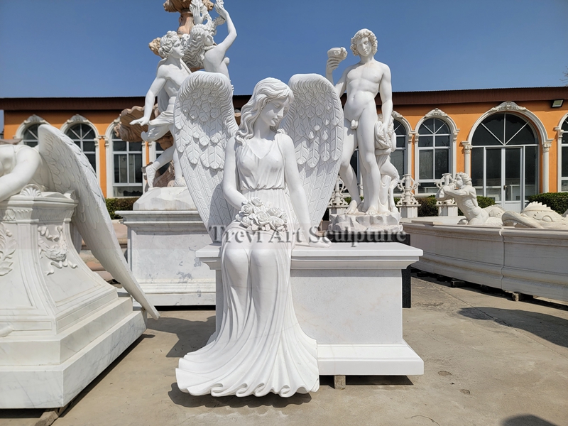 sitting angel headstone