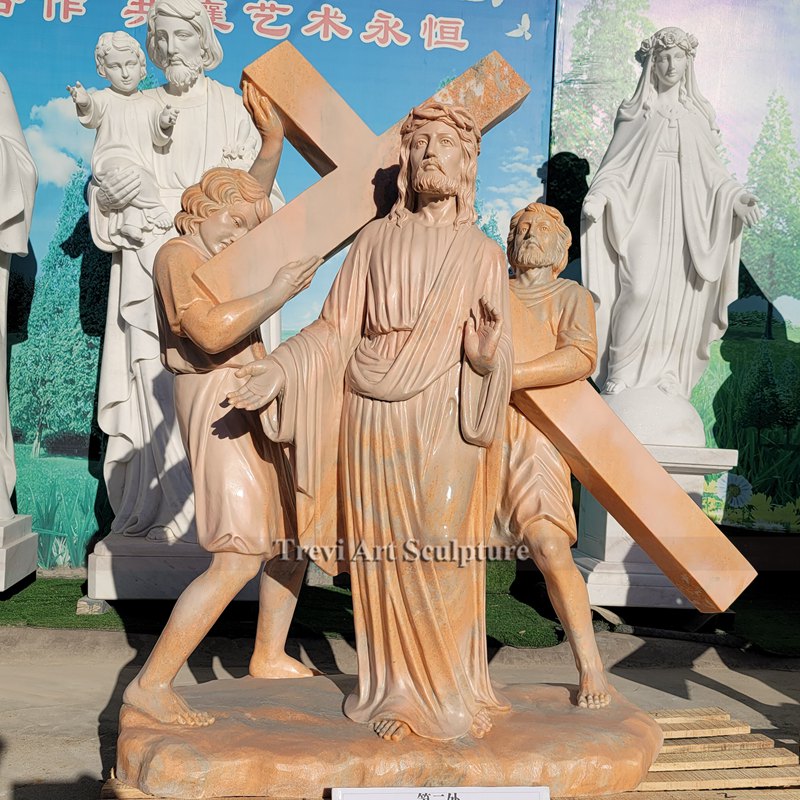 jesus takes up his cross red marble statue
