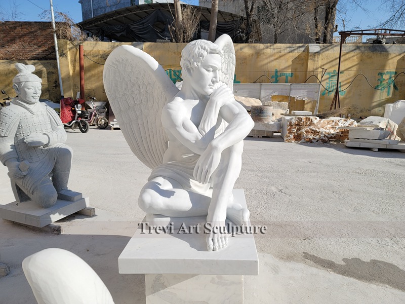 marble sitting male angel statues