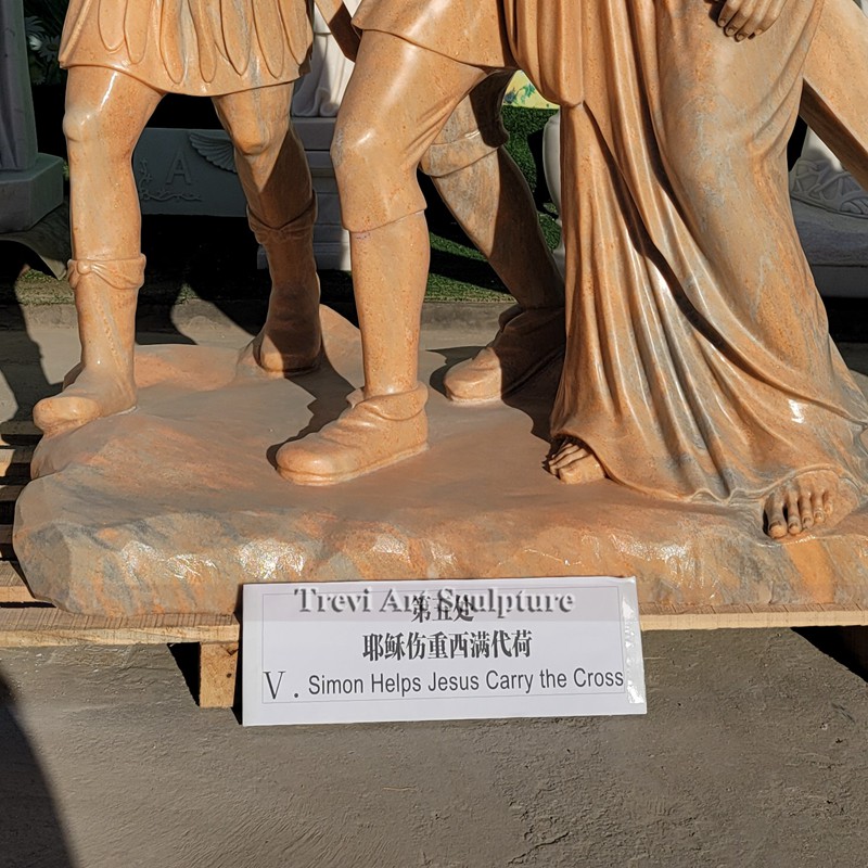 simon helps jesus carry his cross sculpture
