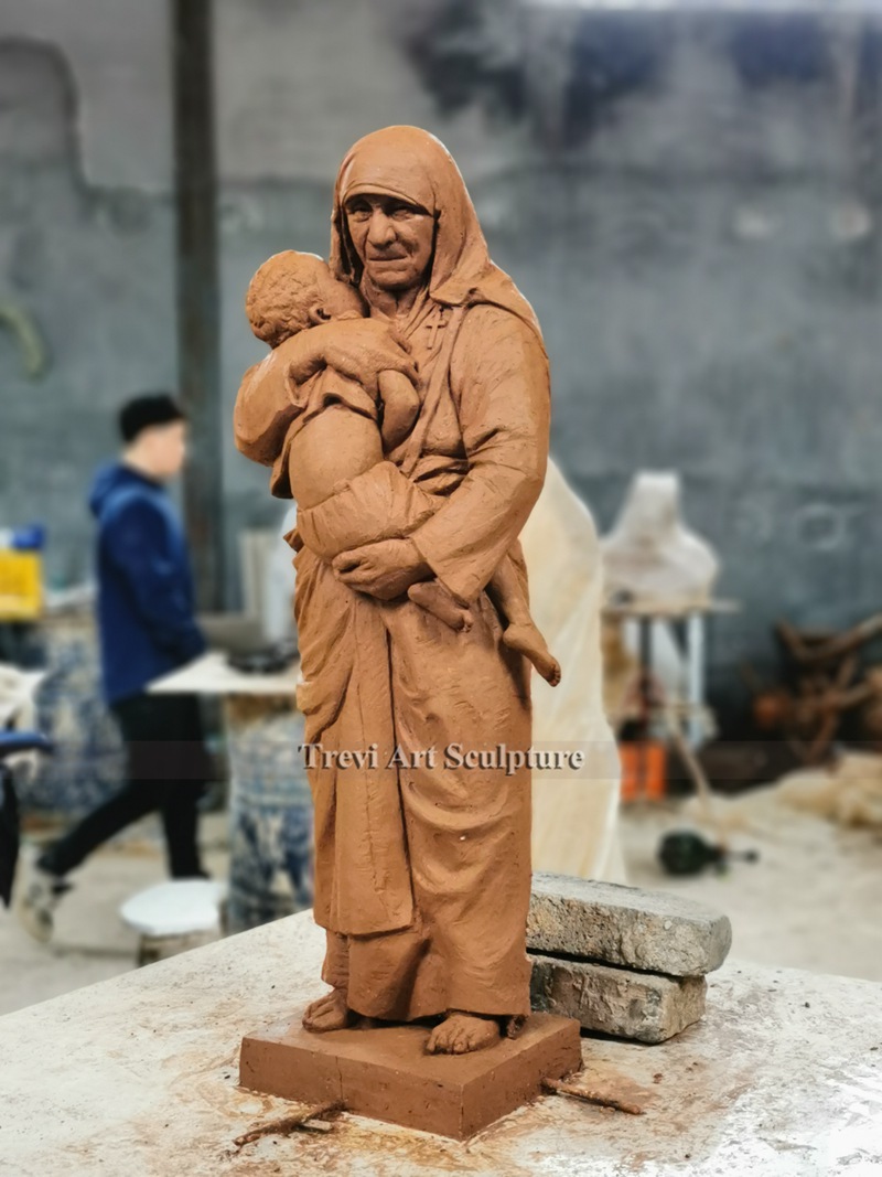 st teresa of calcutta with children statue clay model
