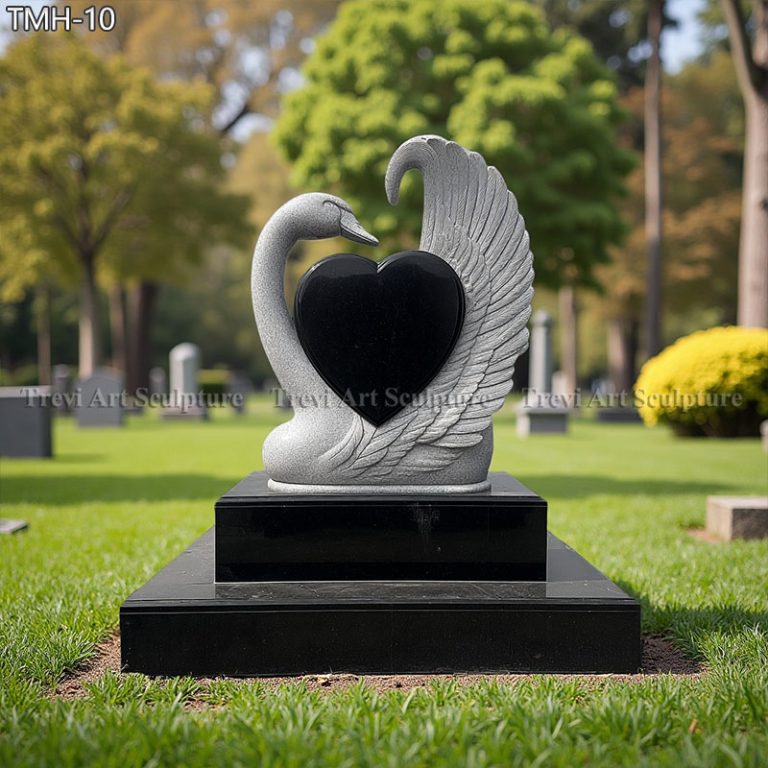 hand carved black granite swan memorials