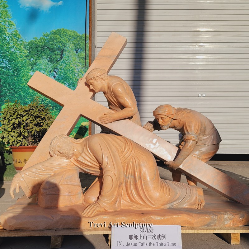 jesus falls the third time red marble statue