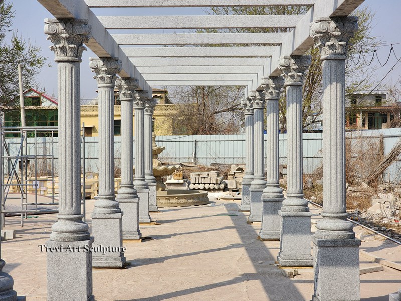 large outdoor stone pillar pergola