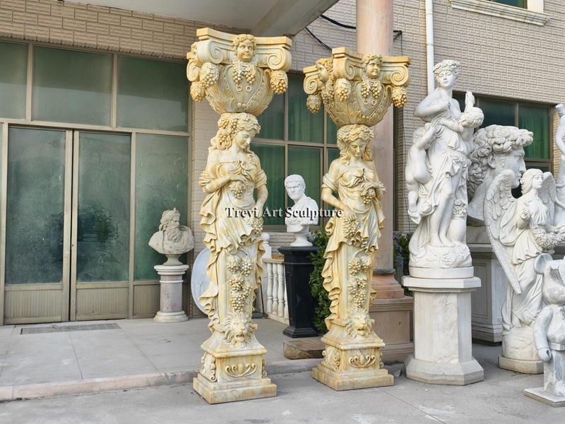 caryatid sculpture adorned with grapevines
