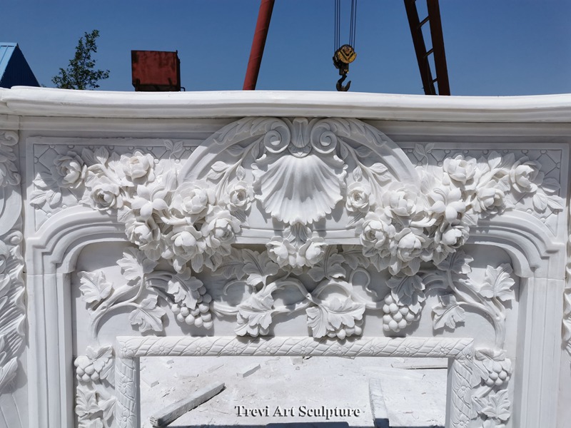 intricate floral marble fireplace