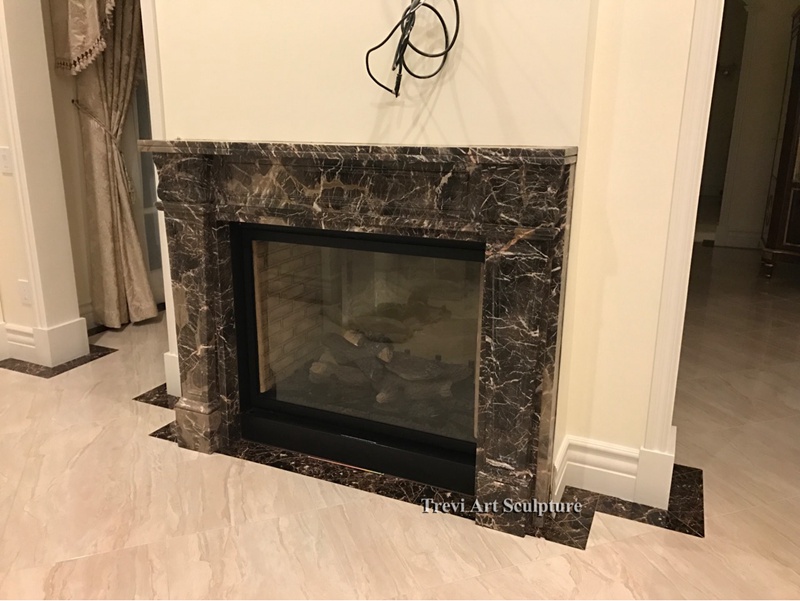 sleek black marble fireplace