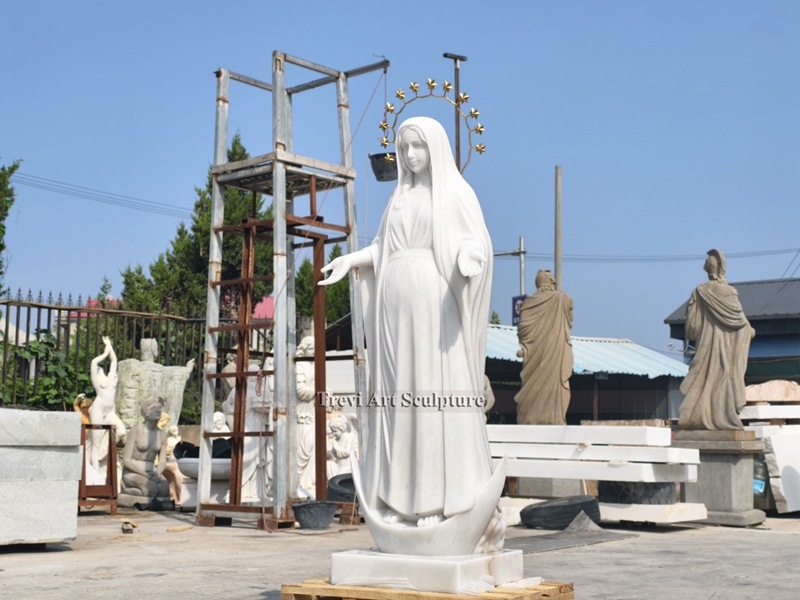 white pregnant mother mary statue