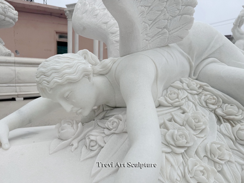 angel lying down statue for graveyard