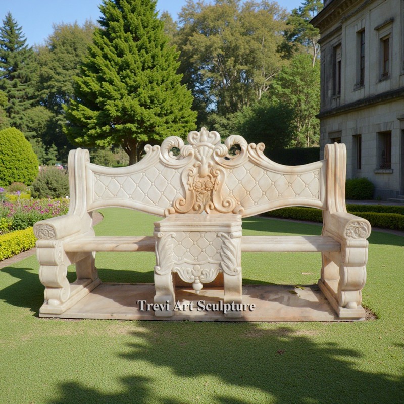 outdoor bench with intricate carvings
