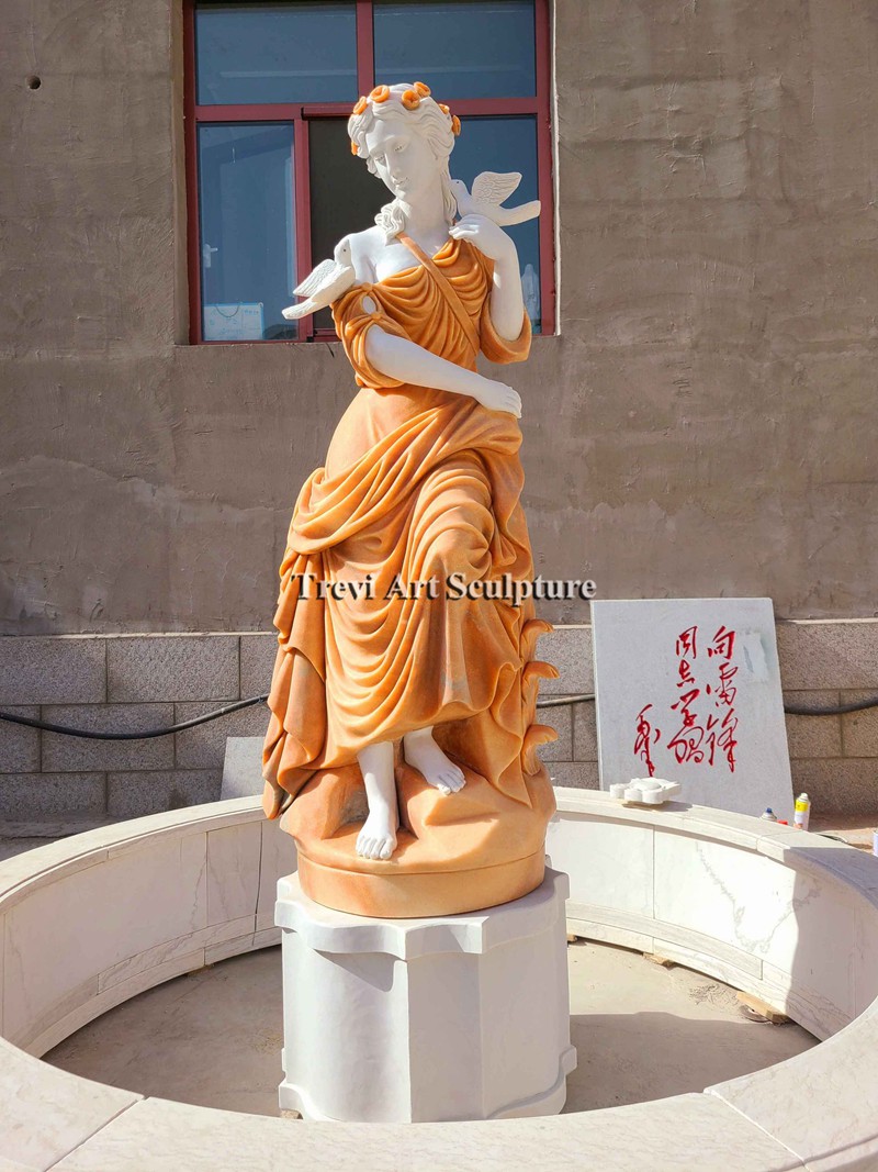 outdoor water fountain lady statue