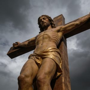 why do catholics have jesus on the cross