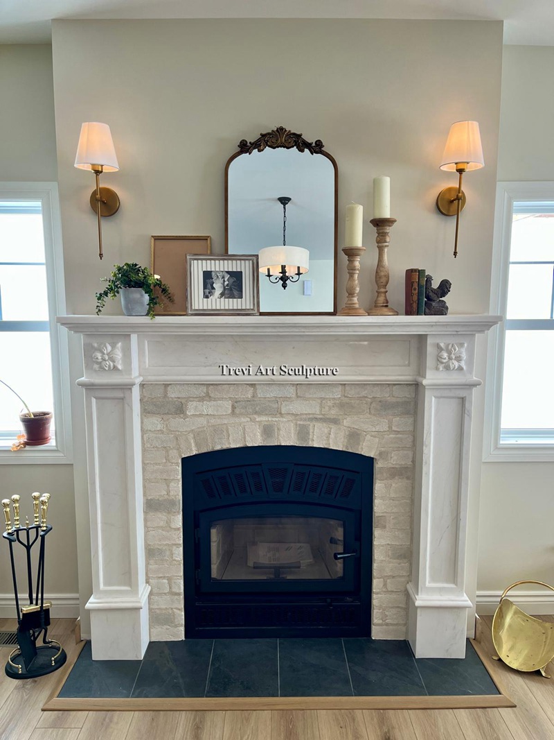 a photo of the marble fireplace after installation, as shared by an american customer