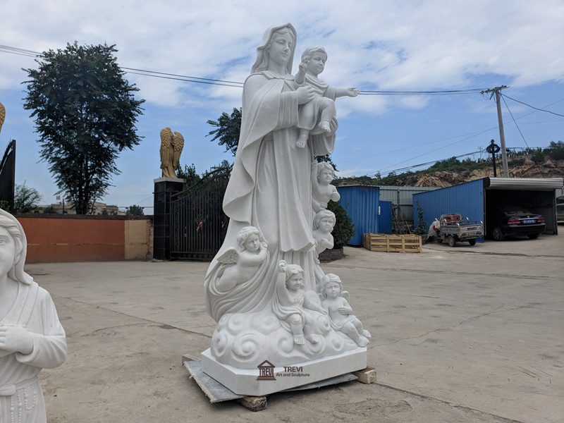 white marble mary holding baby statue