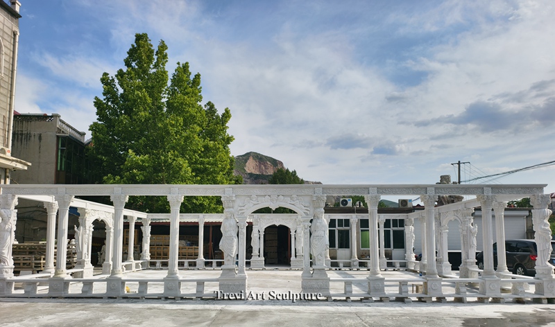 large white marble pergola with sculpted column